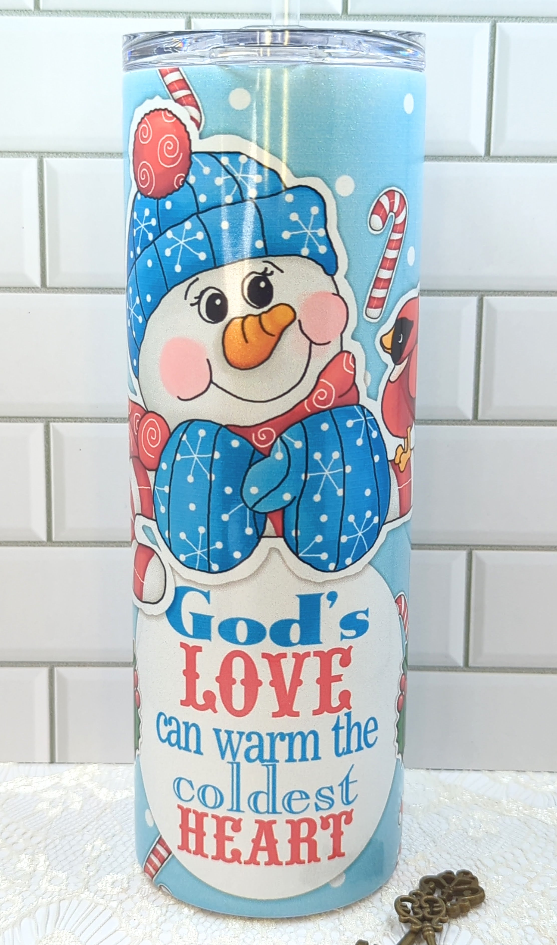 20 oz Warming Cold Heart Snowman on a Glittered Sublimation Tumbler